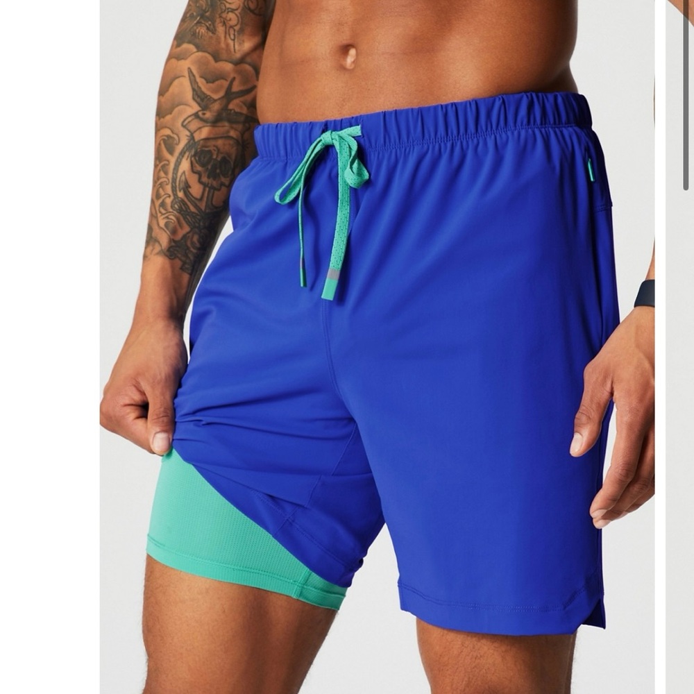 Fabletics The One Mens 7” Shorts in Oxford Blue/Green Lined XXL Athletic Running